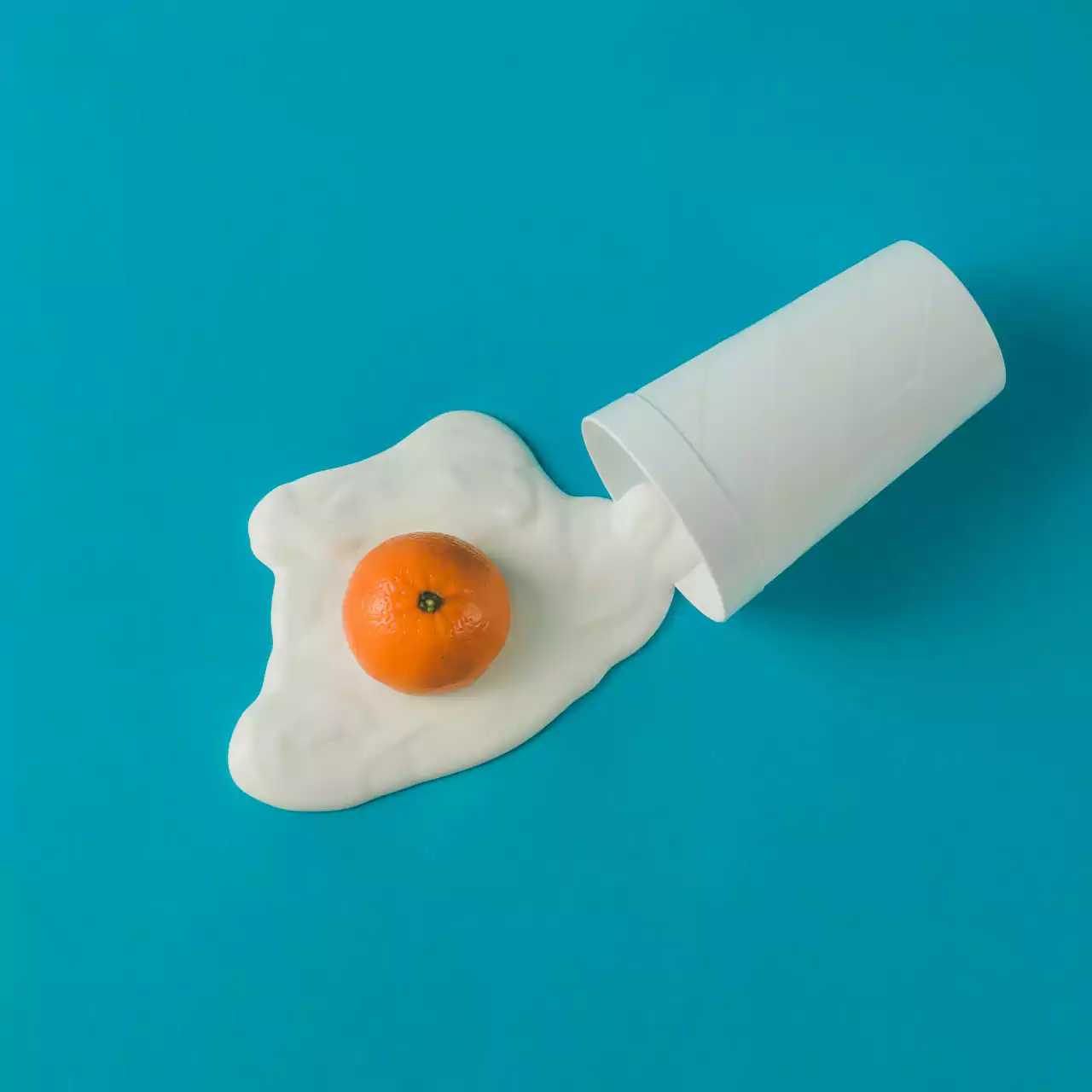 creative-breakfast-layout-orange-and-yogurt-fried-egg-flat-lay-food-concept